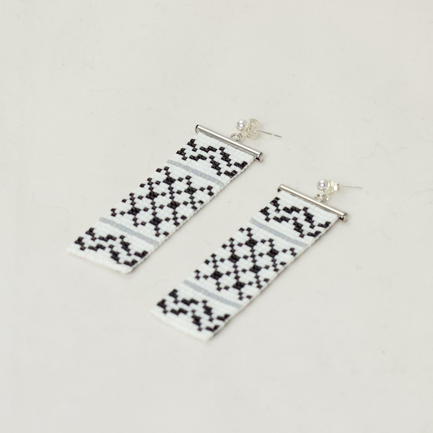 Kuffiyeh earrings with Palestinian symbol of resistance in black white and gray