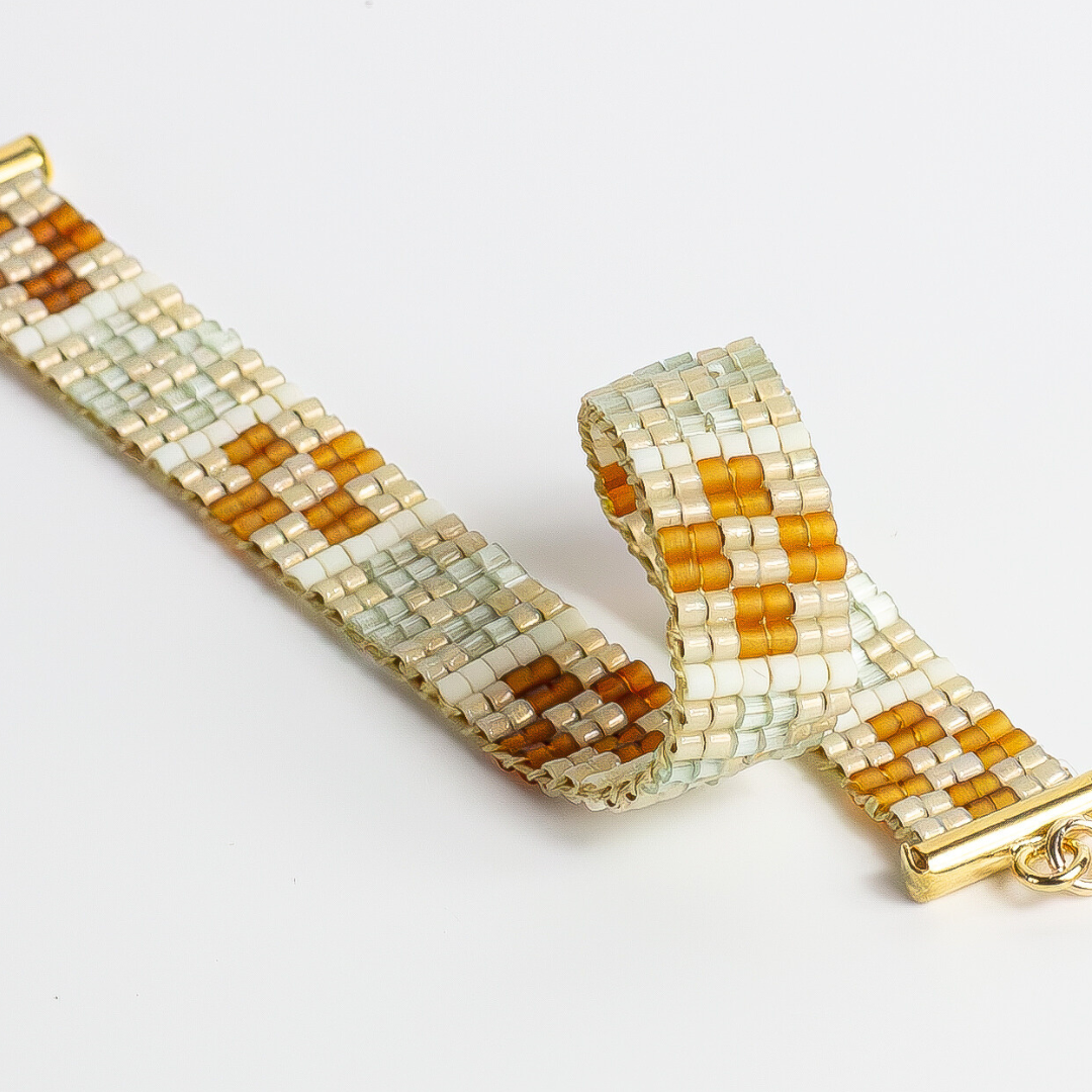 Bracelet with tatreez pattern from yafa in Honey opal green brown and cream