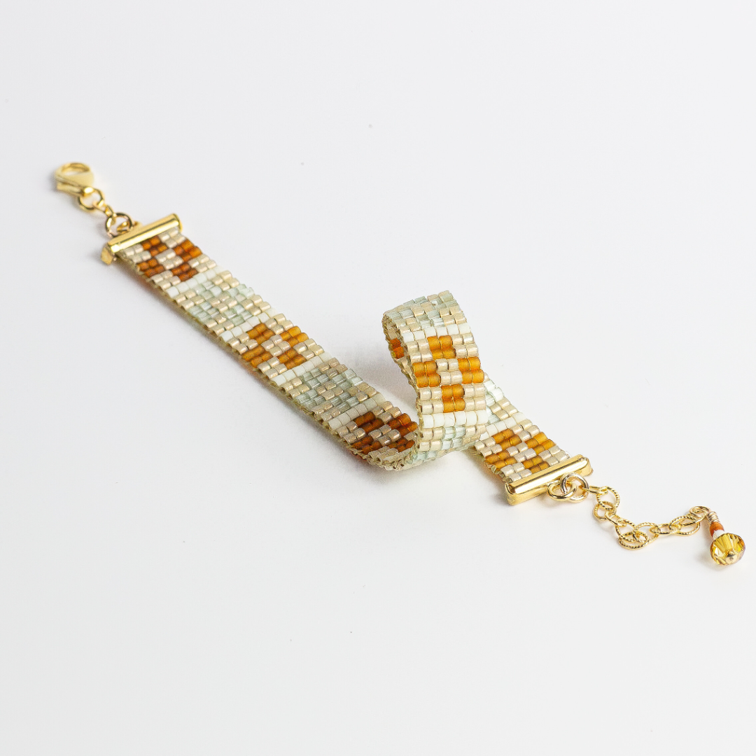 Bracelet with tatreez pattern from yafa in Honey opal green brown and cream