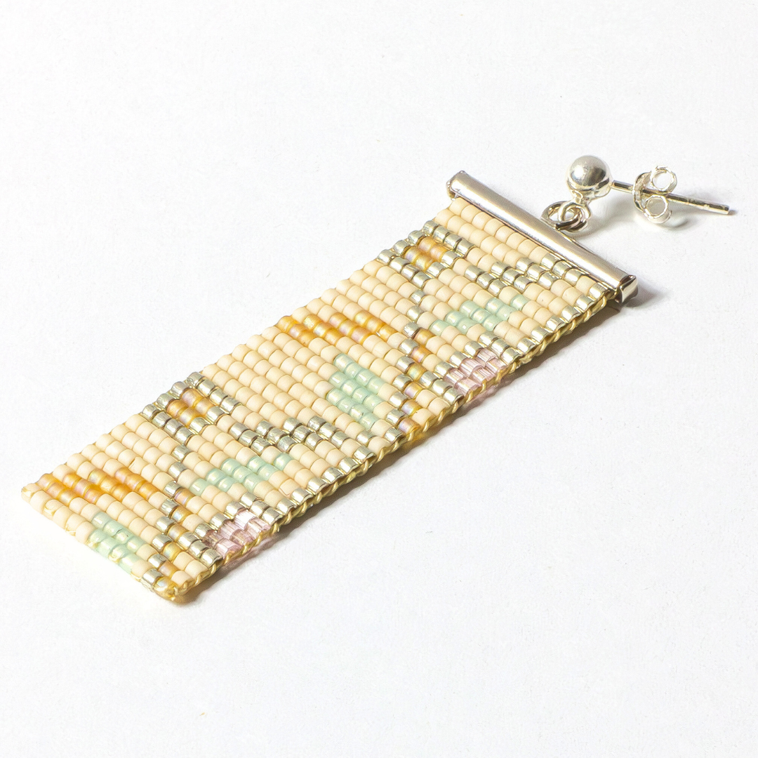 palestinian jewellery (earring) photographed on a white background