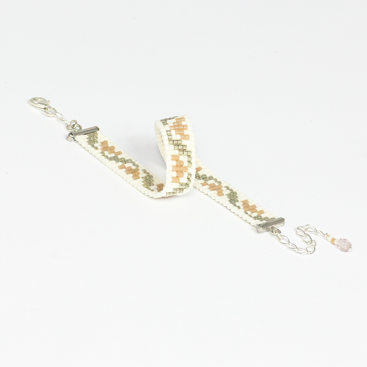 Tulips bracelet showcasing a Tatreez pattern from Ramallah in Beige Cream and Silver