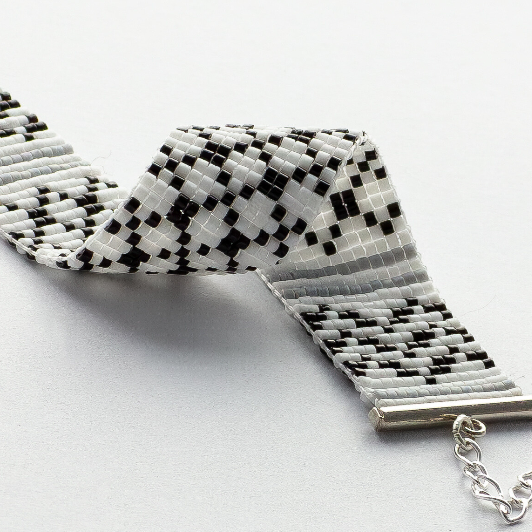 Classic Kuffiyeh bracelet showcasing a Kufiyeh-Keffiyeh in black gray and white