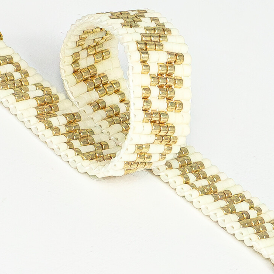 Tulips bracelet showcasing a Tatreez pattern from Ramallah in Cream and Gold