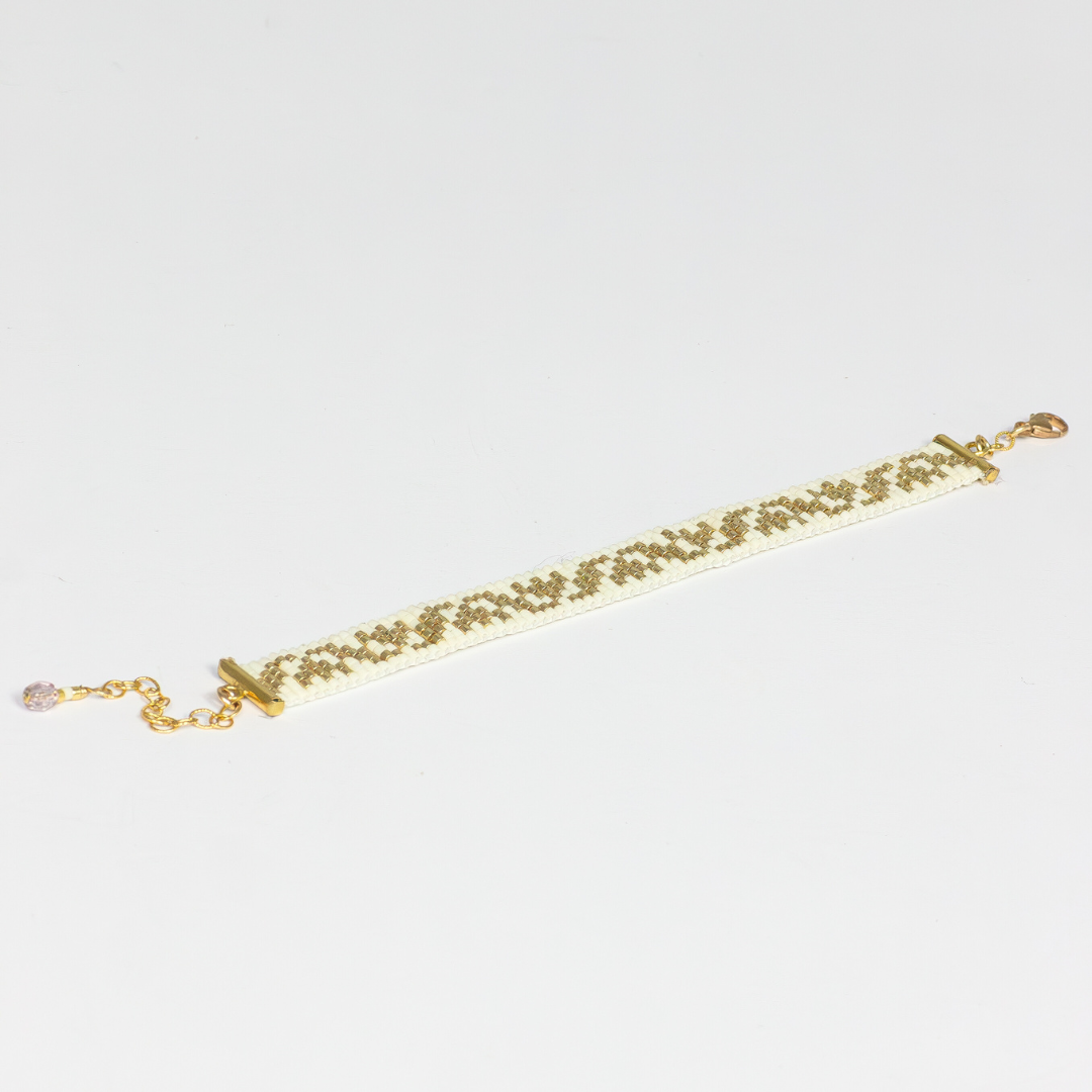 Tulips bracelet showcasing a Tatreez pattern from Ramallah in Cream and Gold