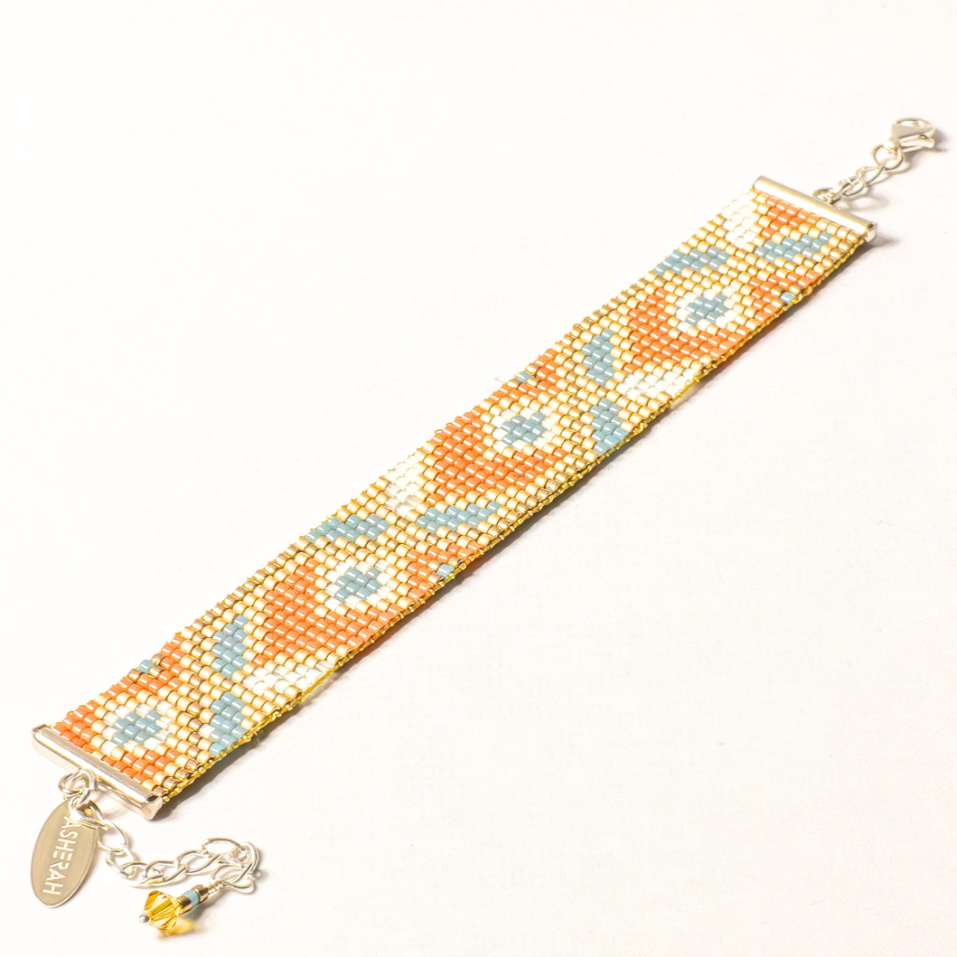 Miyuki Delica handwoven bracelet with Tatreez Pattern on a white background