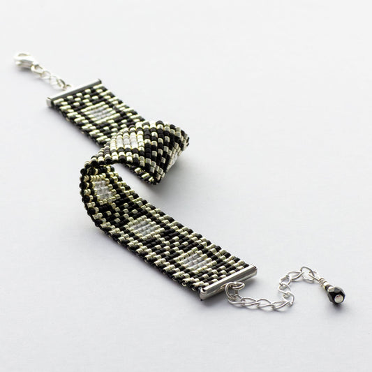 The Watches bracelet featuring Palestinian Tatreez pattern, handmade with high-quality Miyuki glass beads