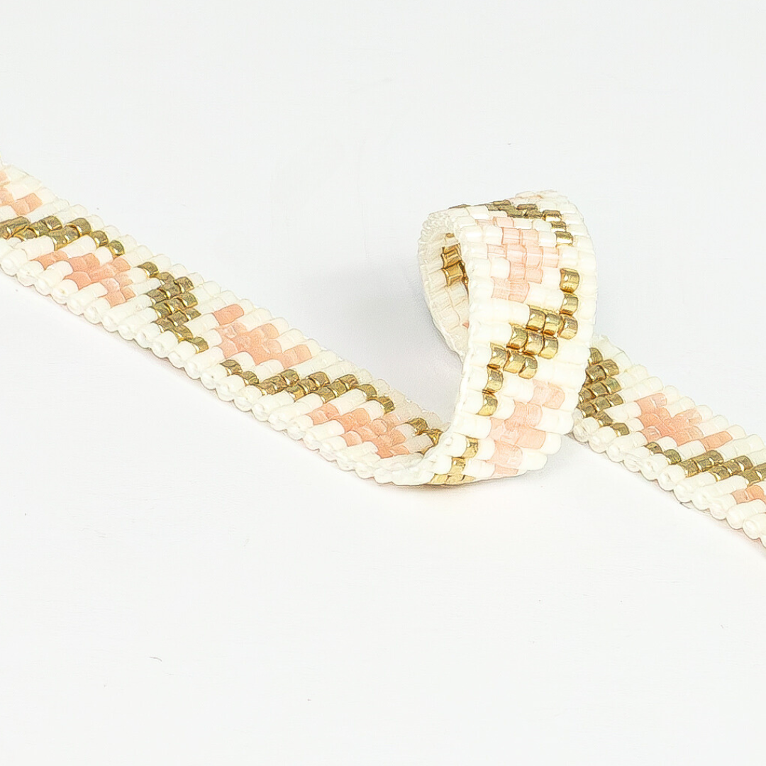 Tulips bracelet showcasing a Tatreez pattern from Ramallah in Pink Cream and Gold