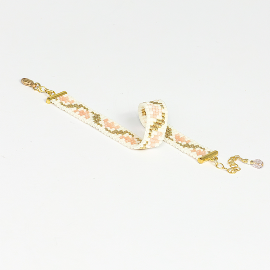 Tulips bracelet showcasing a Tatreez pattern from Ramallah in Pink Cream and Gold