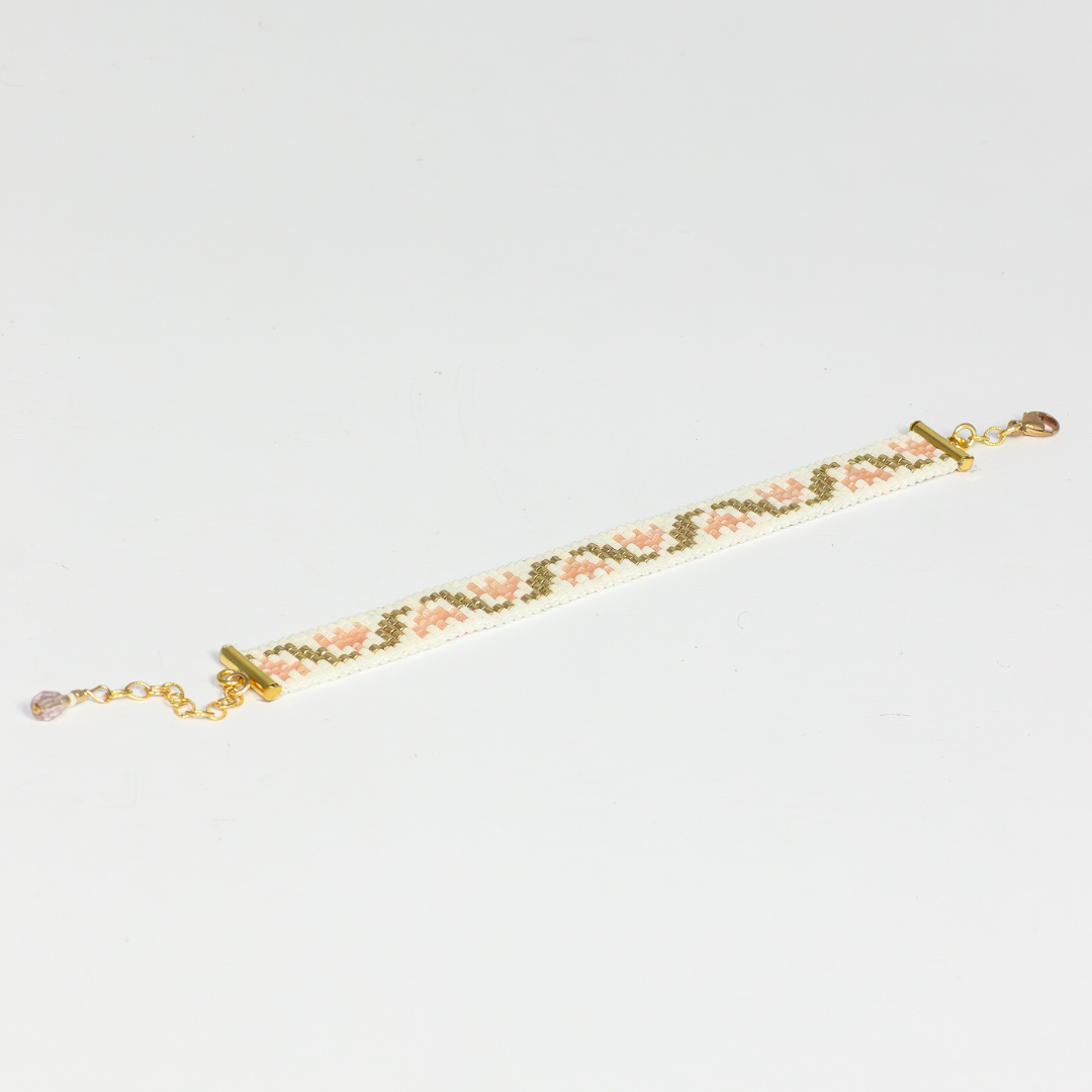 Tulips bracelet showcasing a Tatreez pattern from Ramallah in Pink Cream and Gold