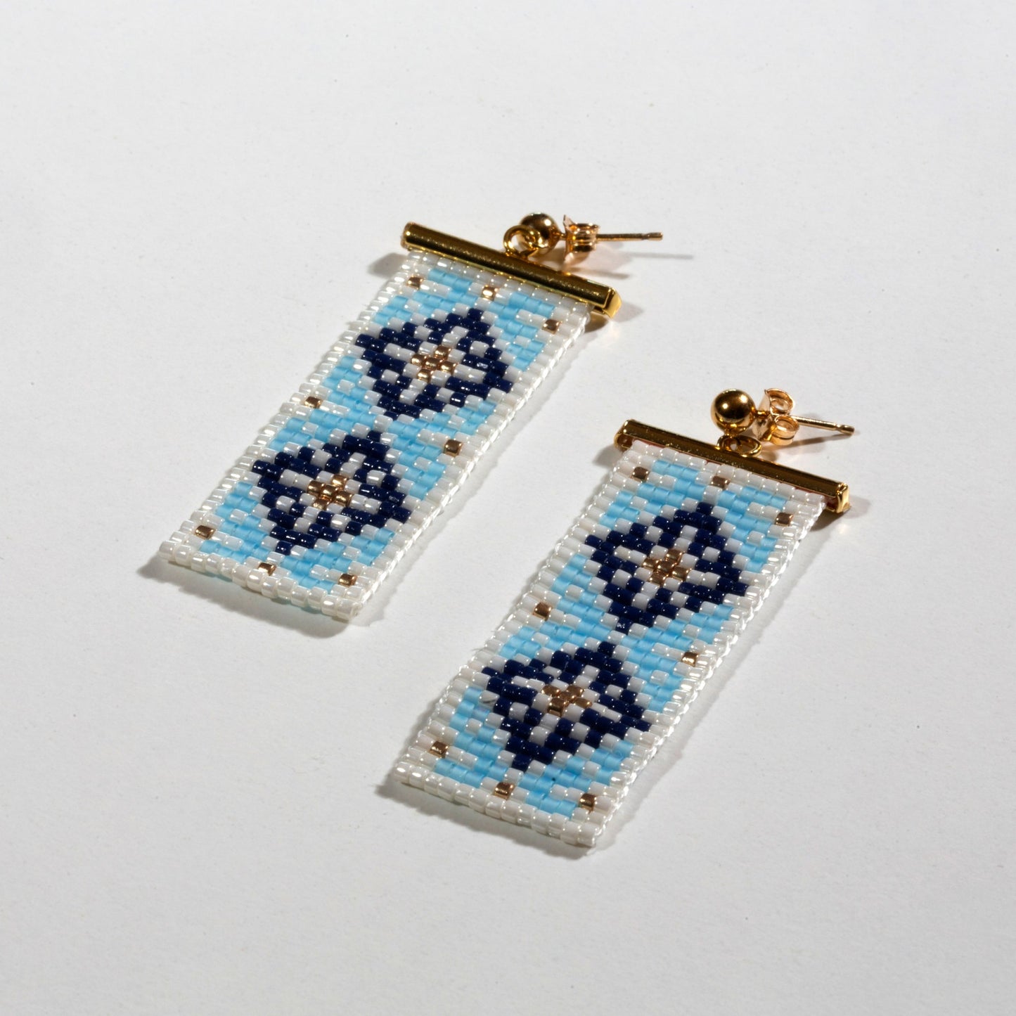 Ramallah Earringsin Blue White Background