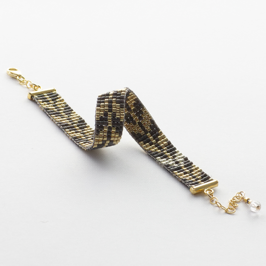 Trees bracelet showcasing a Tatreez pattern from Esdud in Gray, Grey and Gold