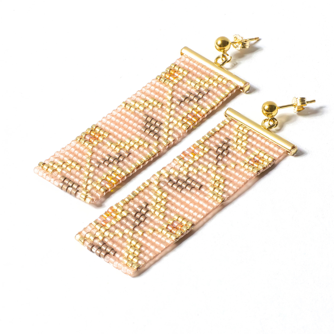 handwoven earrings with gold filled posts on a white background