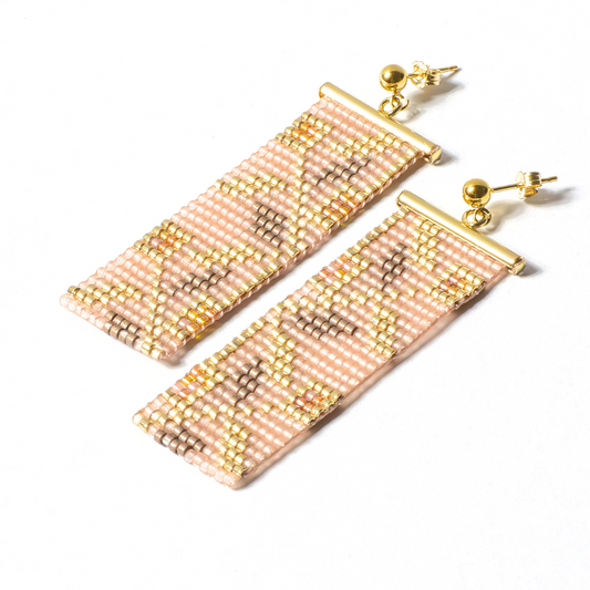handwoven earrings with gold filled posts on a white background
